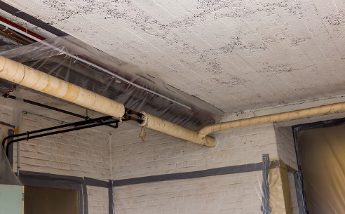Home inspector examining roofline during residential inspection in Salt Lake City