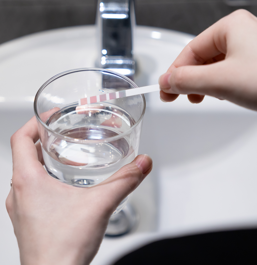 Technician using environmental testing equipment at Salt Lake City property