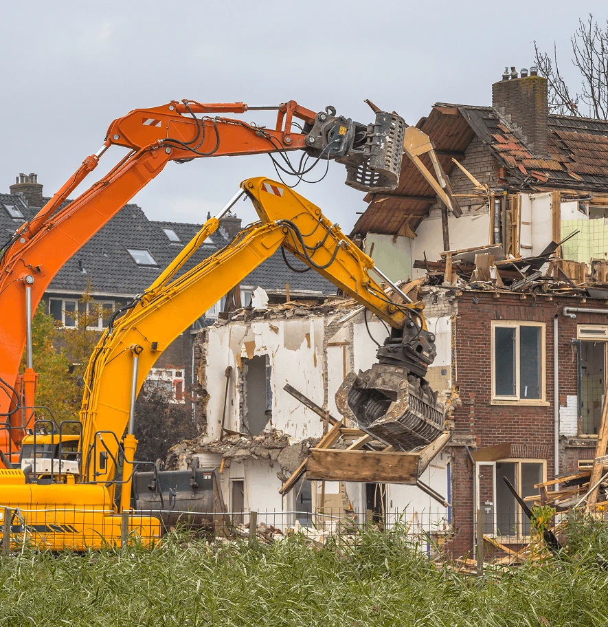 Construction worker conducting pre-demolition asbestos assessment in Salt Lake City