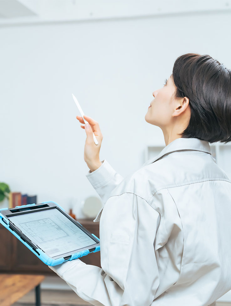 Professional reviewing asbestos inspection results with property owner in Salt Lake City