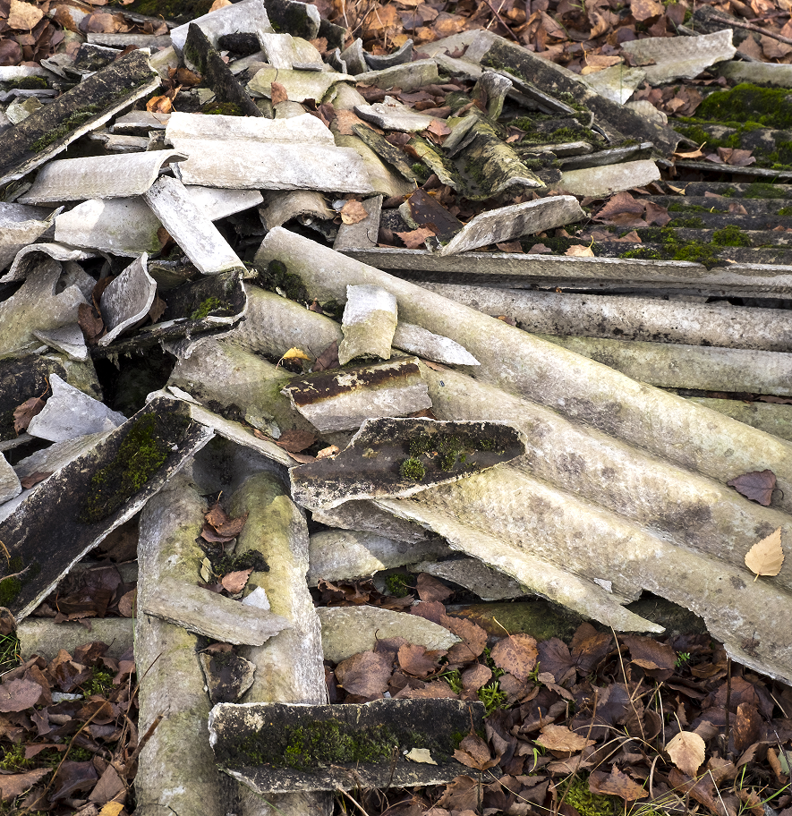 Pile of old asbestos-containing rubble and material debris