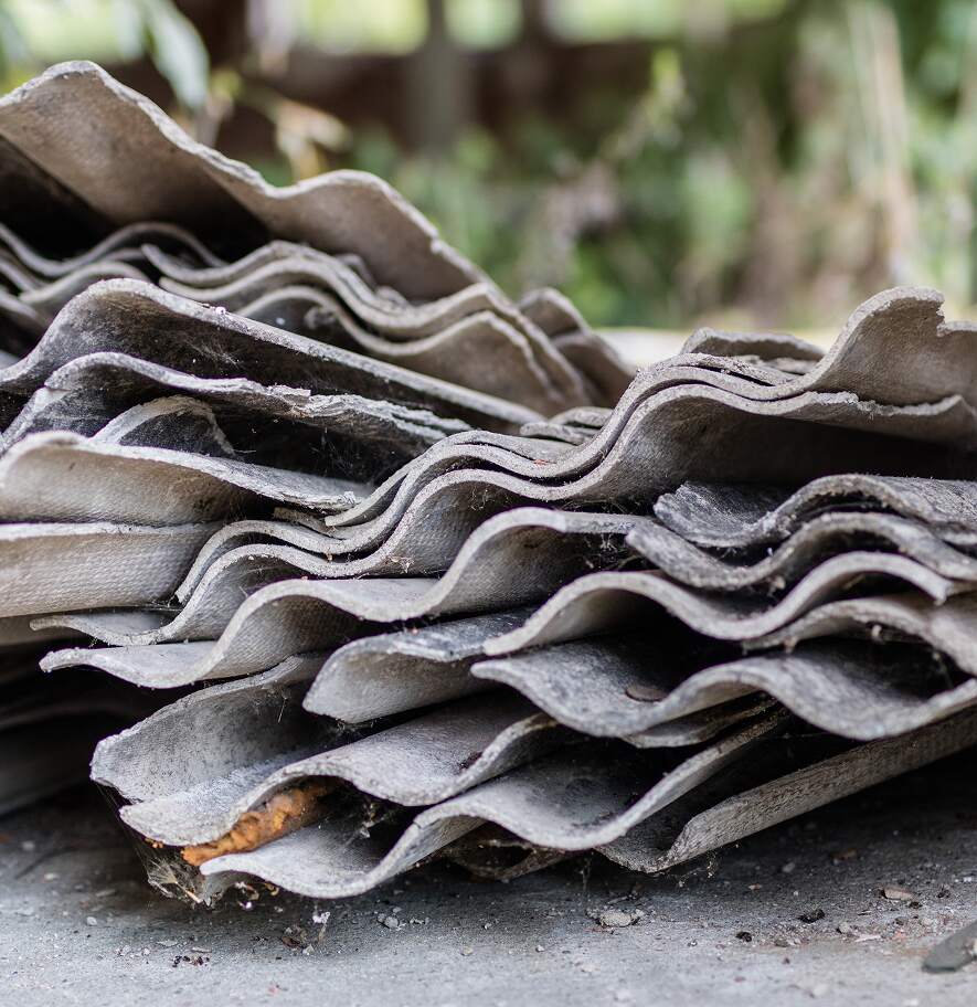 Old corrugated roofing material potentially containing asbestos fibers