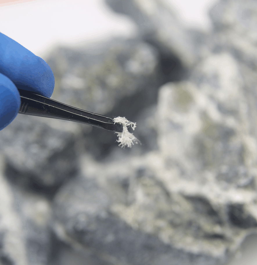 Asbestos abatement professional following Utah safety laws on job site